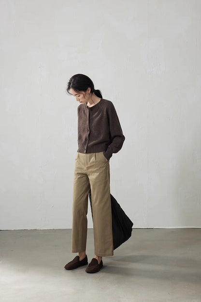 Dark Coffee Brown cropped cardigan styled with beige trousers