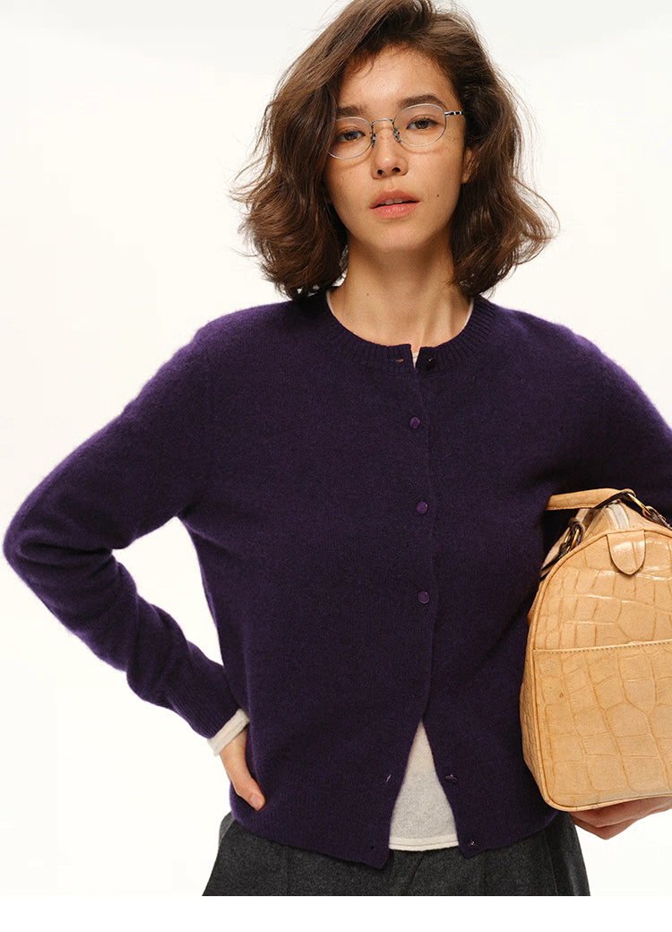 Close-up of deep purple yak-cashmere cardigan showing neckline and buttons