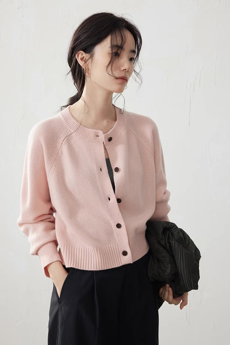 Soft Pink Merino wool cropped cardigan front close-up on model