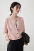 Soft Pink Merino wool cropped cardigan front close-up on model