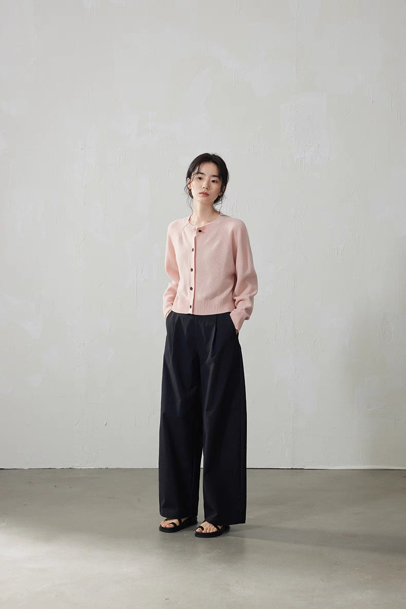Soft Pink cropped Merino wool cardigan styled with wide-leg black pants