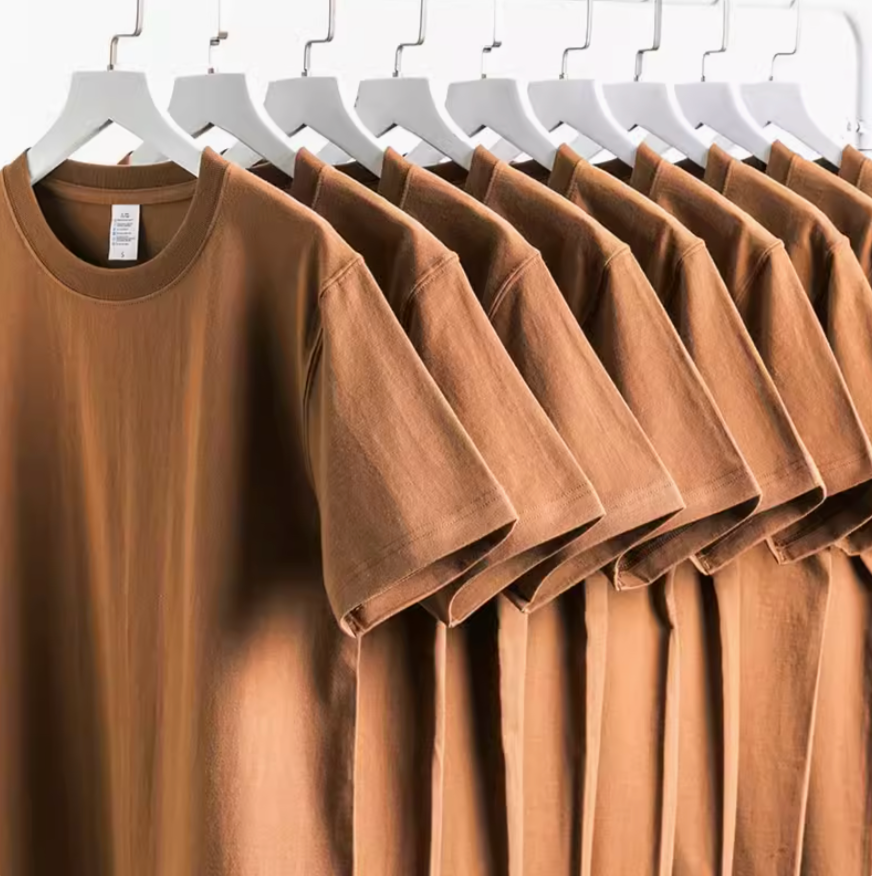 Casual Caramel Tee Dark Caramel multiple T-shirts on hangers short sleeve cotton display