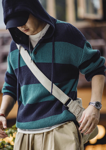 Casual Striped Waffle-Knit Pullover Hoodie Blue-Green Stripes with hood up styled in streetwear look showing relaxed silhouette and drawstring hood design