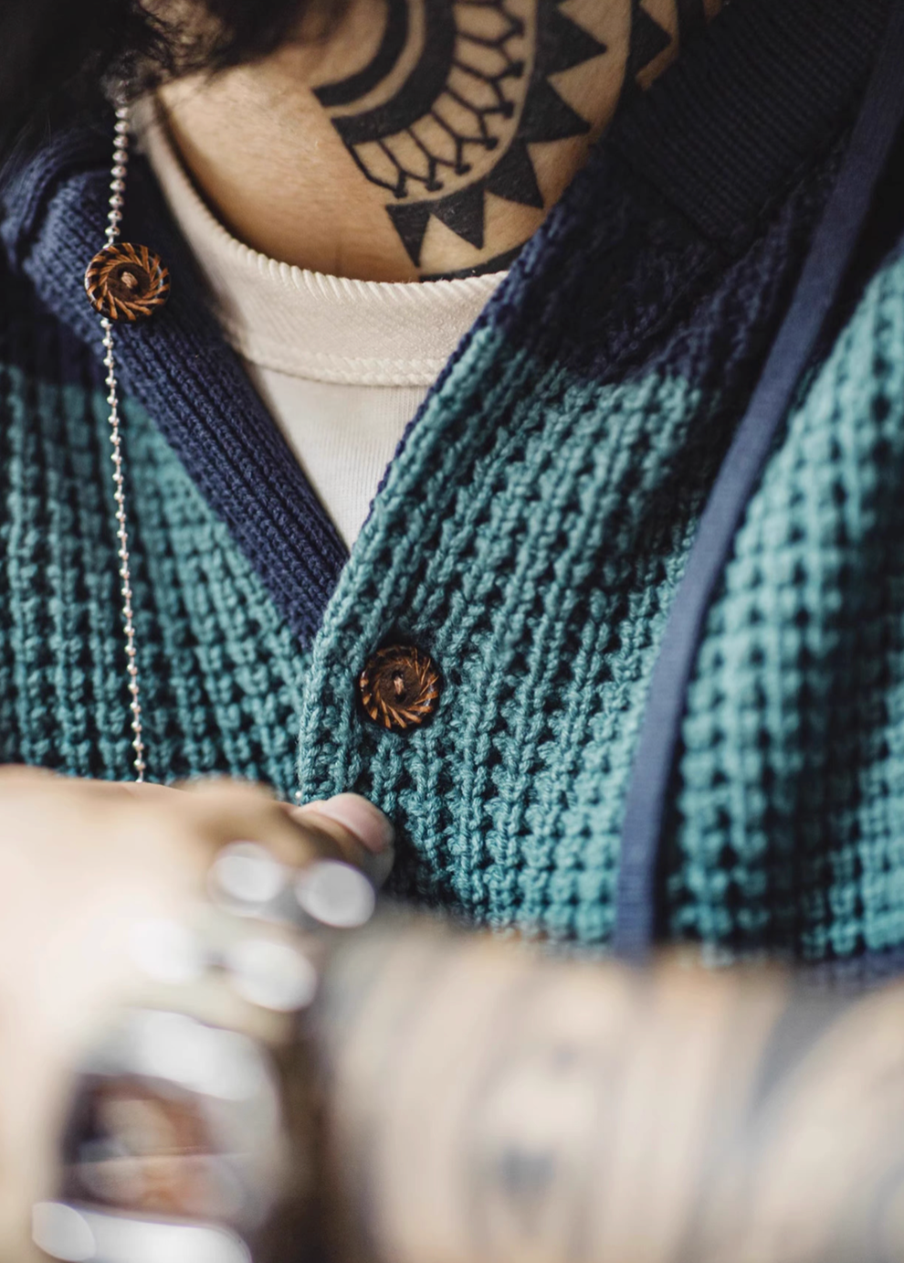 Casual Striped Waffle-Knit Pullover Hoodie Blue-Green Stripes neckline detail featuring wooden buttons ribbed trim and layered styling look