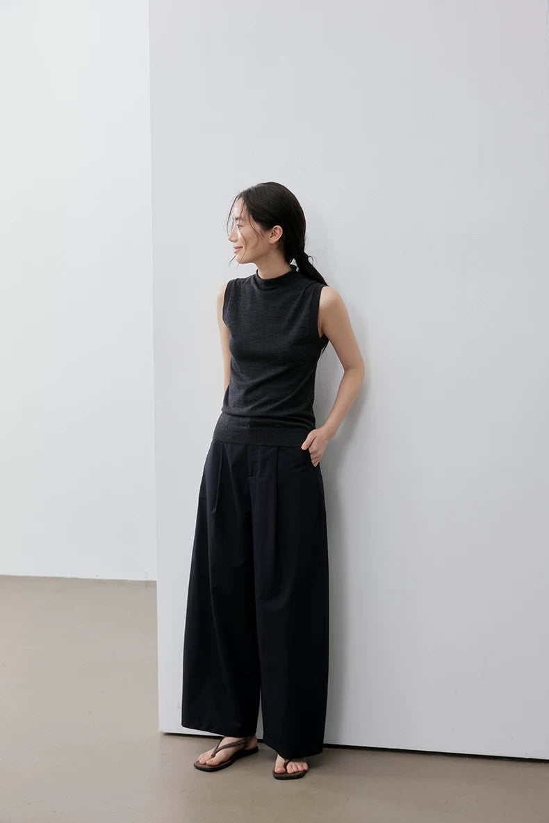 Full-length side view of Charcoal Gray sleeveless mock neck knit top