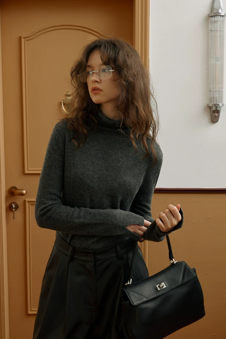 Charcoal fine-knit cashmere turtleneck with long fitted sleeves and ribbed cuffs