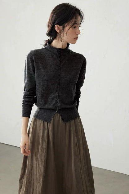 Charcoal wool cardigan, side view on model