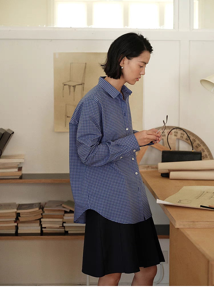 Checkered Ease Shirt blue plaid side view showing button down design and relaxed H line silhouette