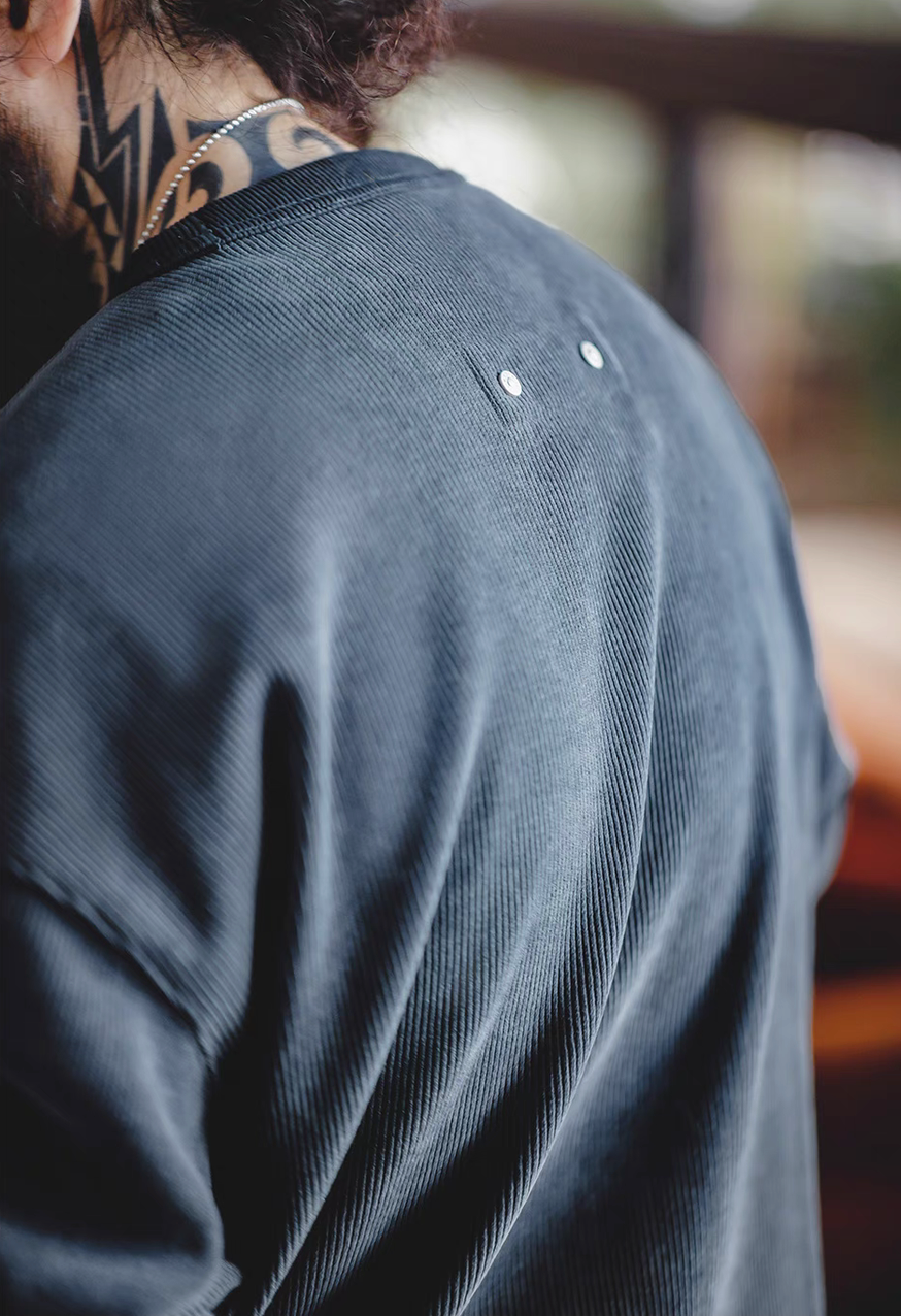 Navy chenille crew sweater back shoulder detail showing fabric texture and stitching near neckline