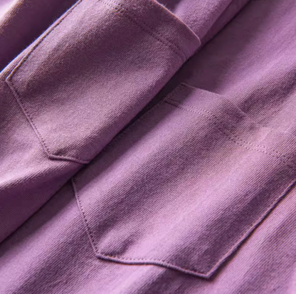 Chic Pocket Tee purple chest pocket close-up showing stitching and fabric texture detail