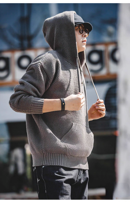 Chunky Waffle Knit Pullover Hoodie gray worn with hood up highlighting textured knit, drawstrings, and streetwear styling