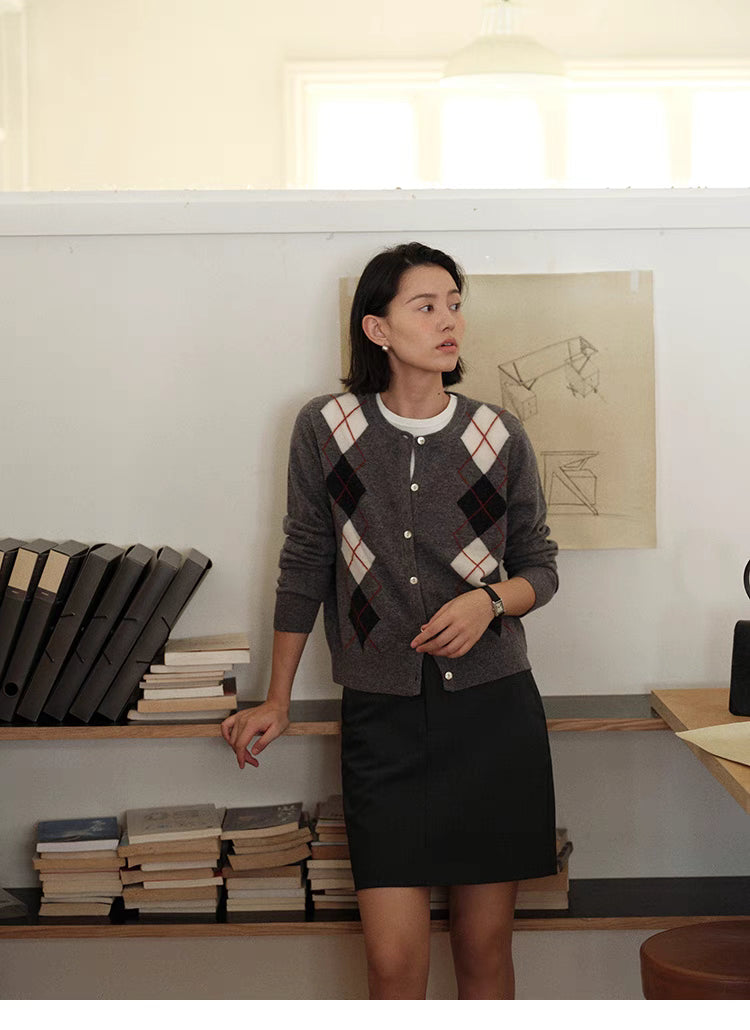 Light gray Classic Argyle Wool Cardigan styled with black skirt, full body preppy Ivy League outfit