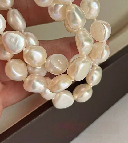 Close-up of Classic Baroque Pearl Necklace showing natural freshwater pearl texture and radiant luster