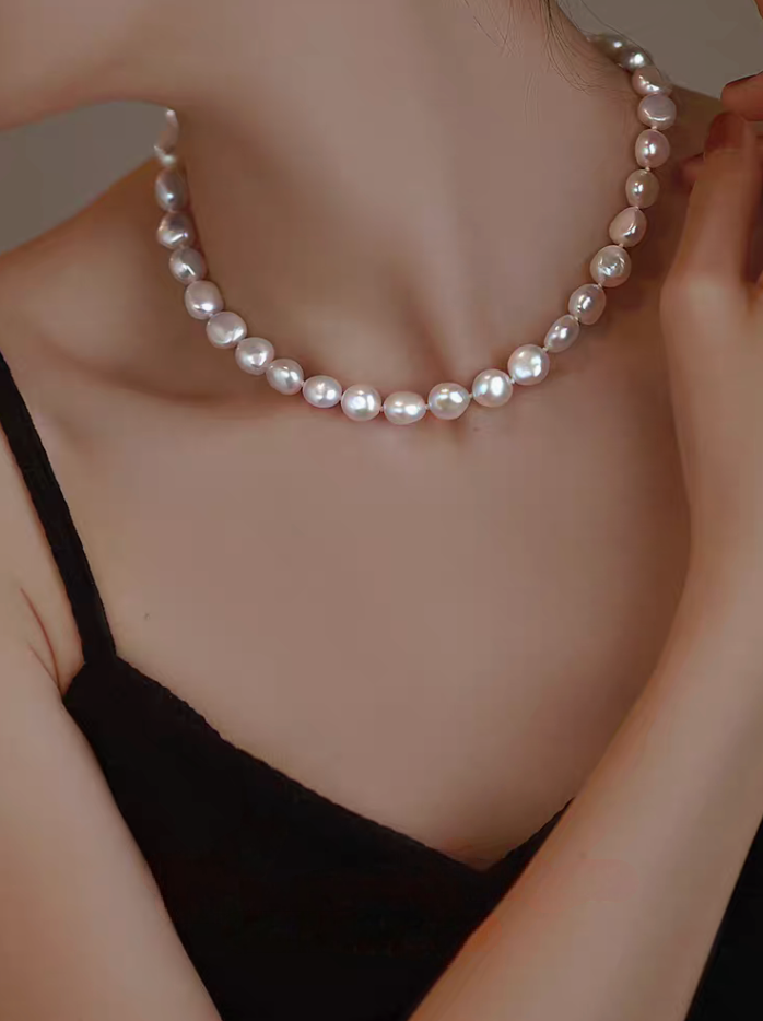 Classic Baroque Pearl Necklace worn on model close-up showing natural baroque freshwater pearls choker style