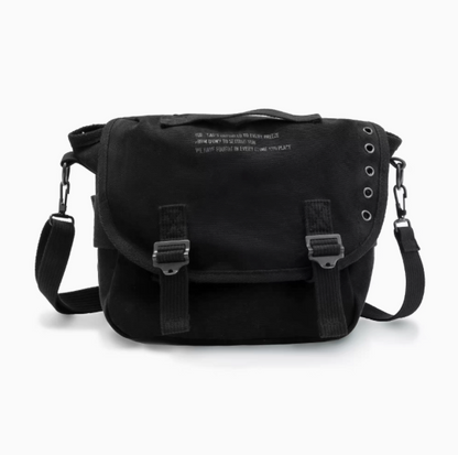Classic M1961 canvas motorcycle bag in black front view showing flap closure buckle straps and adjustable shoulder strap