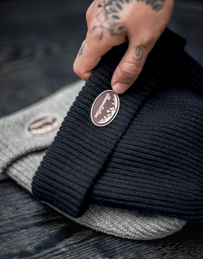 Classic Ribbed Knit Beanie with Logo Detail in navy blue and gray stacked together showing ribbed texture and logo patch detail