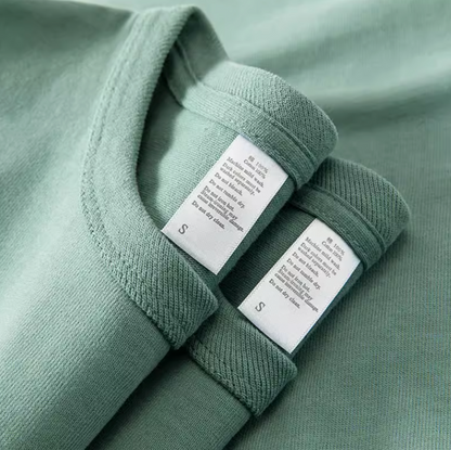 Classic Sage Everyday Tee mineral blue color collar label detail showing crewneck stitching and size tag