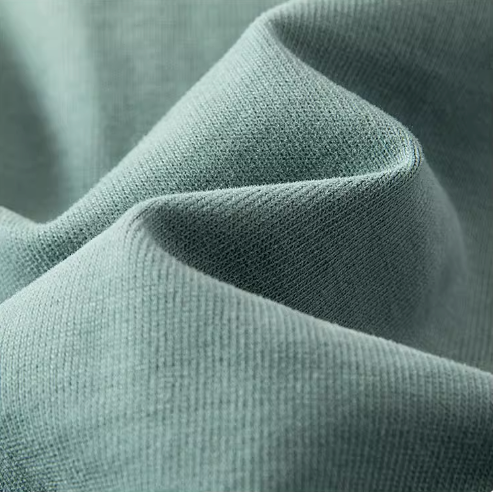 Classic Sage Everyday Tee mineral blue color fabric texture close-up showing soft cotton material