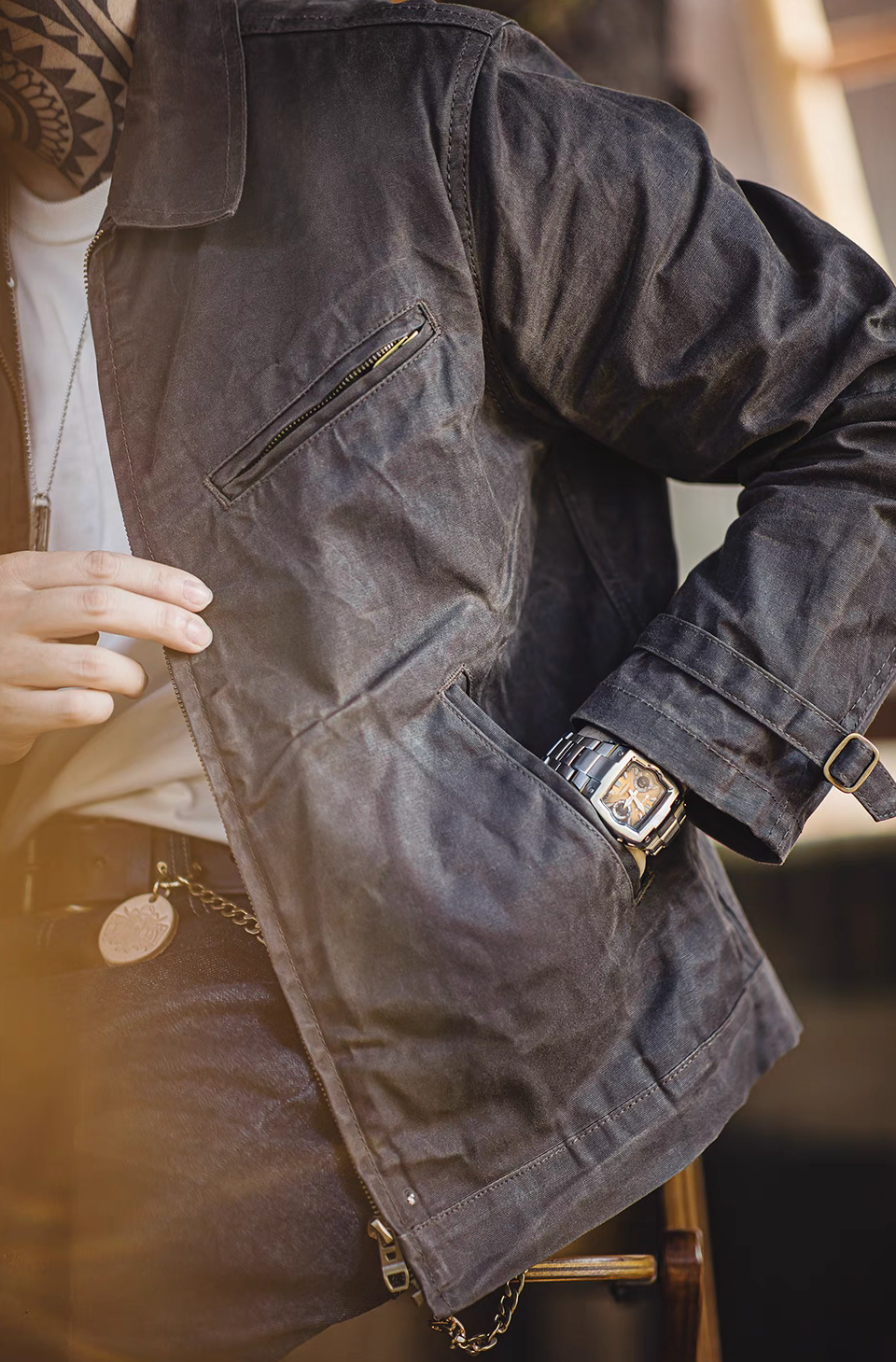 Close-up of Pewter Gray Classic Trail Waxed Jacket highlighting zip chest pocket, front opening and waxed canvas texture