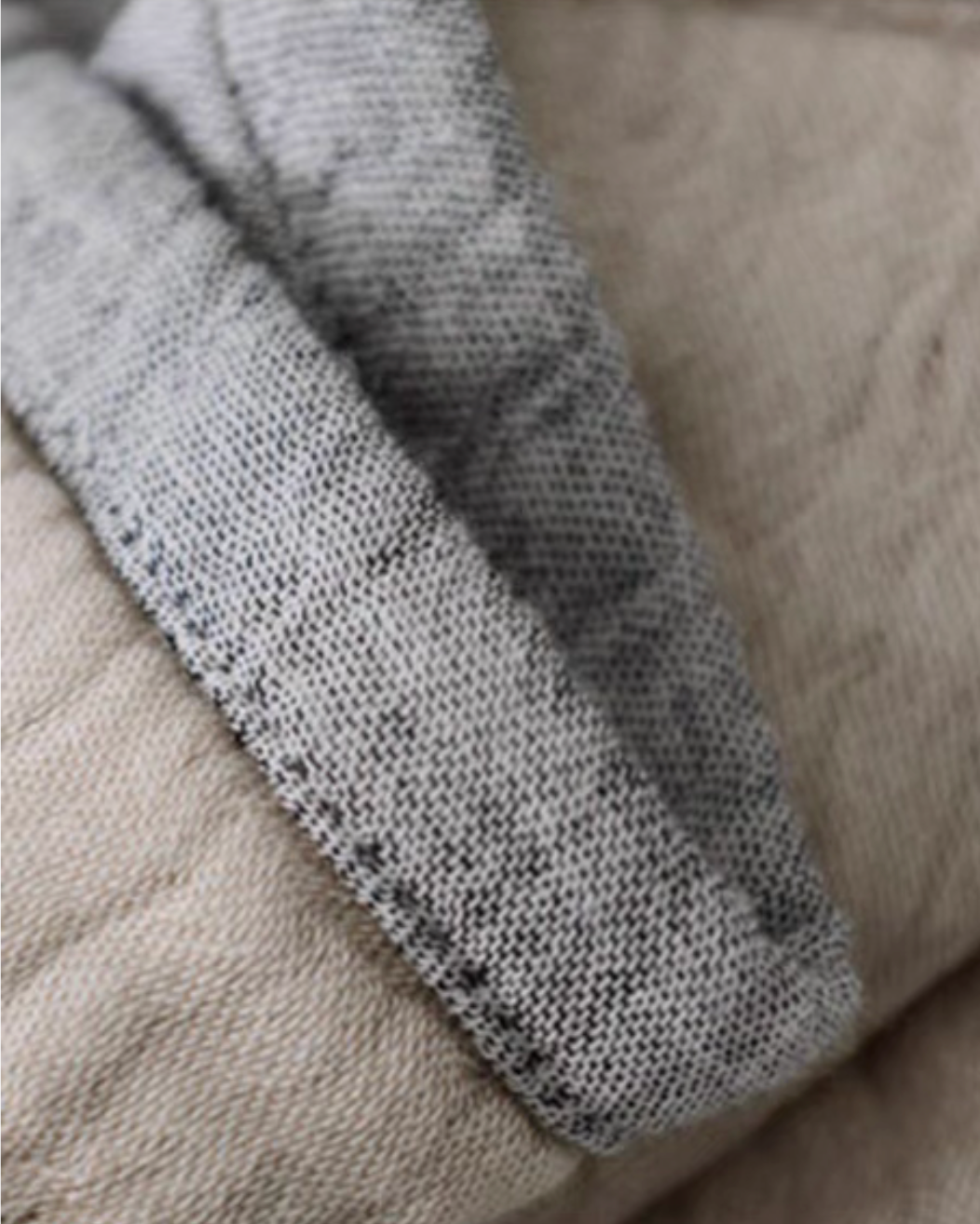 Edge stitching detail of CloudSoft Four-Layer Gauze Cotton Blanket in Gray Camel highlighting layered gauze cotton construction