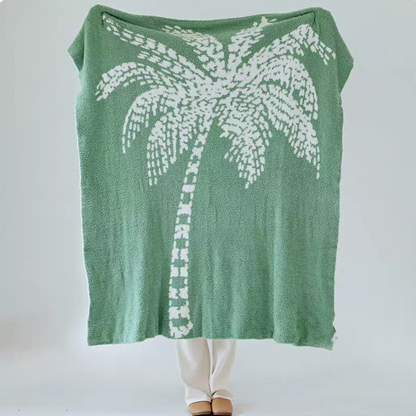 Green coconut tree jacquard throw blanket fully displayed with large white palm tree design