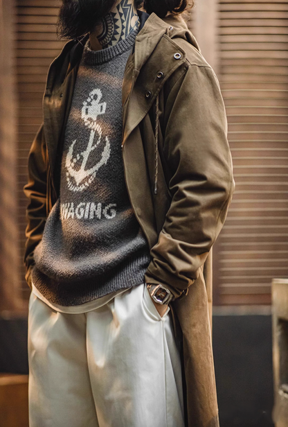 Model wearing Coffee Brown Cotton Windbreaker Coat in army green side view layered over sweater highlighting relaxed fit and pocket design