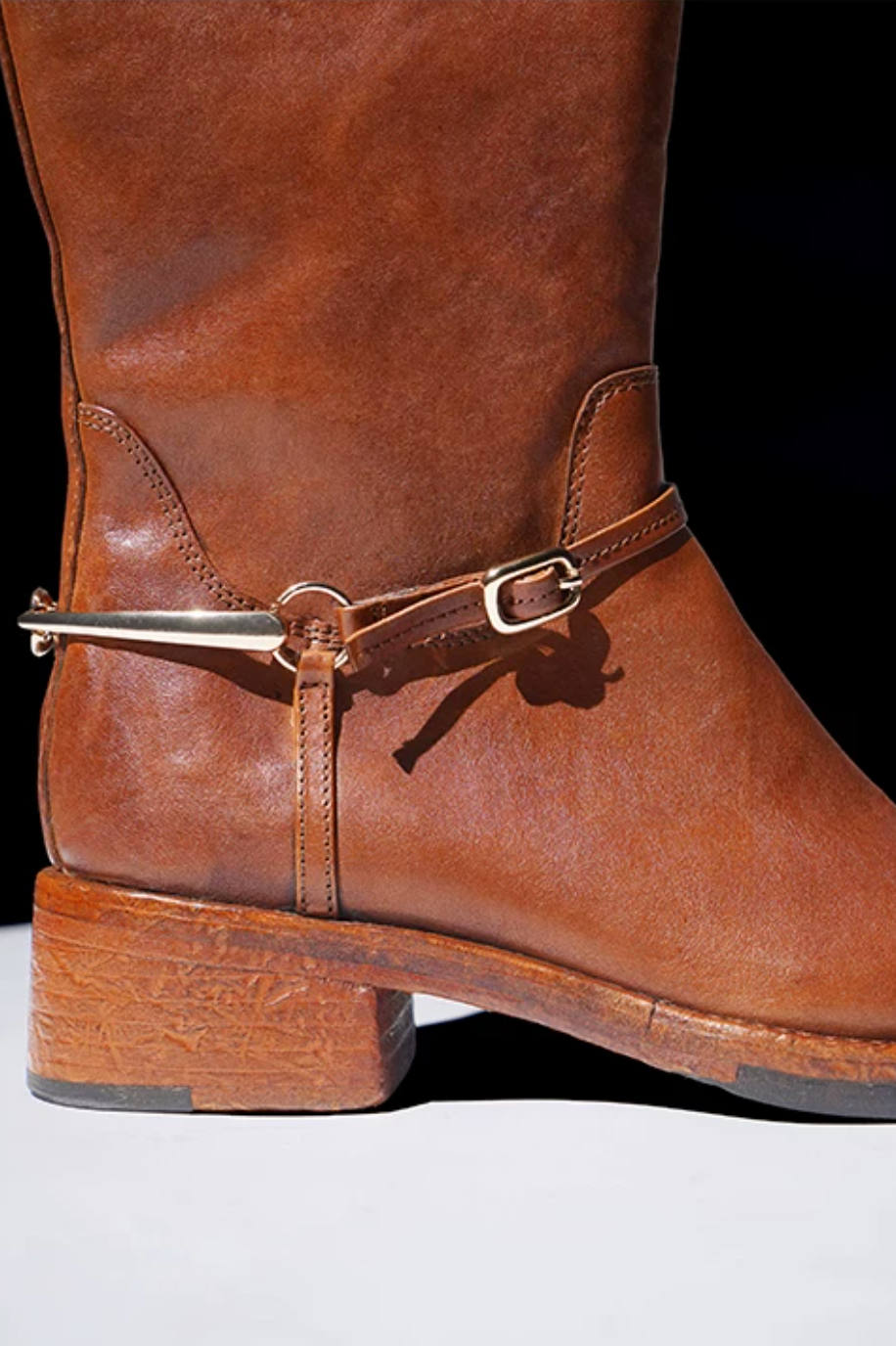 Close-up of a cognac riding boot&