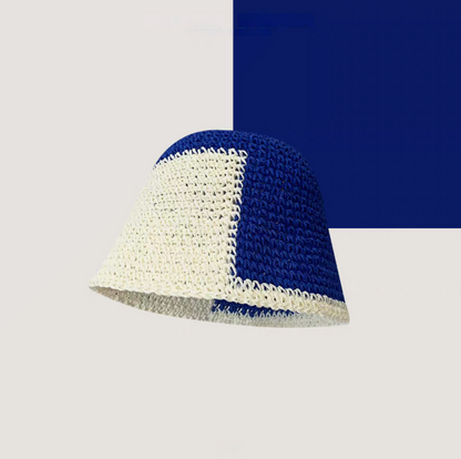 White and blue color-block straw bucket hat front view breathable woven design