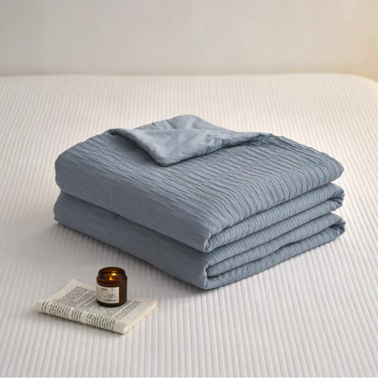 Folded Navy Blue Colorful cotton comforter and sham set showing lightweight cotton fabric and jacquard wave texture
