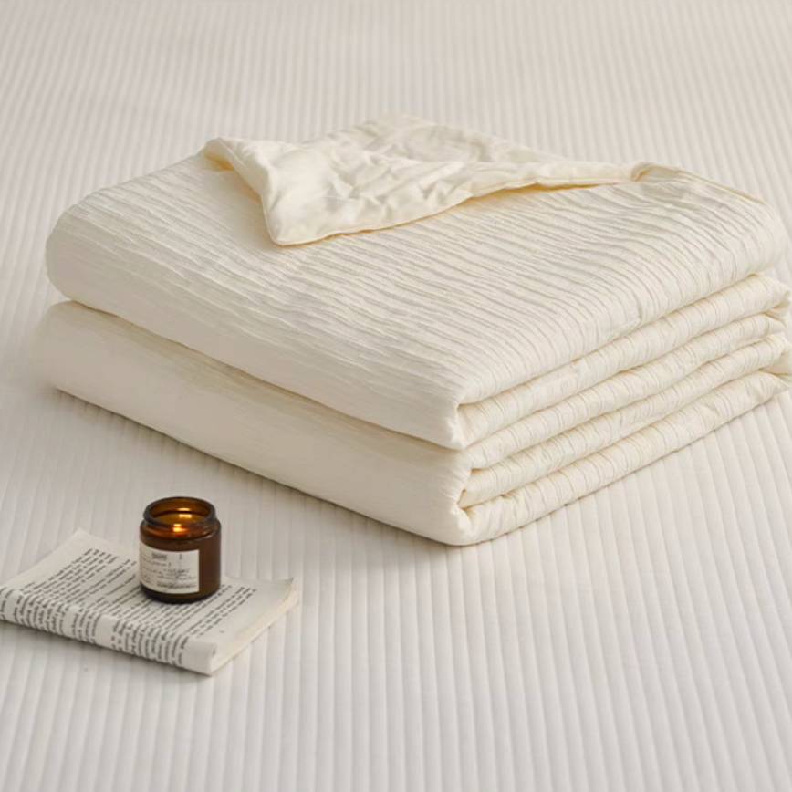 Folded White Colorful cotton comforter and sham set showing soft washed cotton and jacquard wave texture