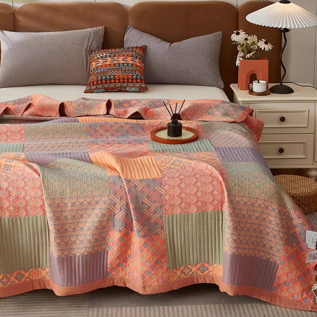 Colorful Harmony Cotton Woven Quilt Pastel Pink patchwork quilt displayed on bed with geometric woven patterns