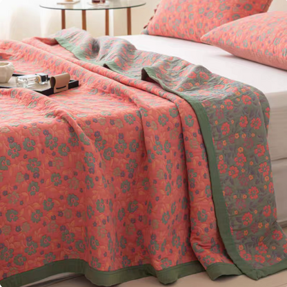 Colorful Harmony Cotton Woven Quilt Vivid Pink Floral cotton quilt with small floral motifs and contrasting trim