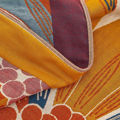 Detailed view of Colorful Super Soft Long-staple Cotton Blanket Sunflower highlighting cotton weave and colorful floral design