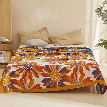 Colorful Super Soft Long-staple Cotton Blanket Sunflower with large colorful floral pattern displayed on bedroom bed