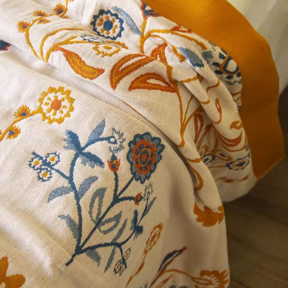 Close-up of Colorful Super Soft Long-staple Cotton Blanket Time Blossom showing breathable cotton fabric and floral print