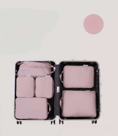Bean Pink Compression Travel Packing Cubes with Shoe and Clothing Organizer Set showing the 7pcs suitcase layout