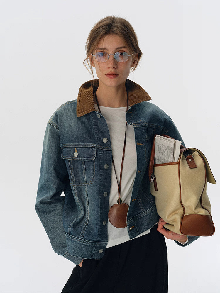 Denim jacket with brown corduroy collar styled with cream canvas leather-trim tote bag