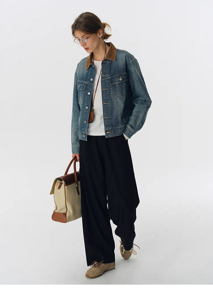 Full-body look with contrast-collar denim jacket, wide-leg black pants, sneakers and canvas leather tote