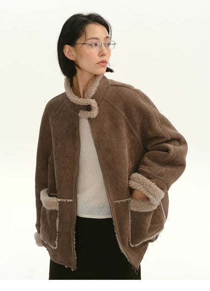 Cocoa brown suede shearling jacket unzipped showing wool-blend interior