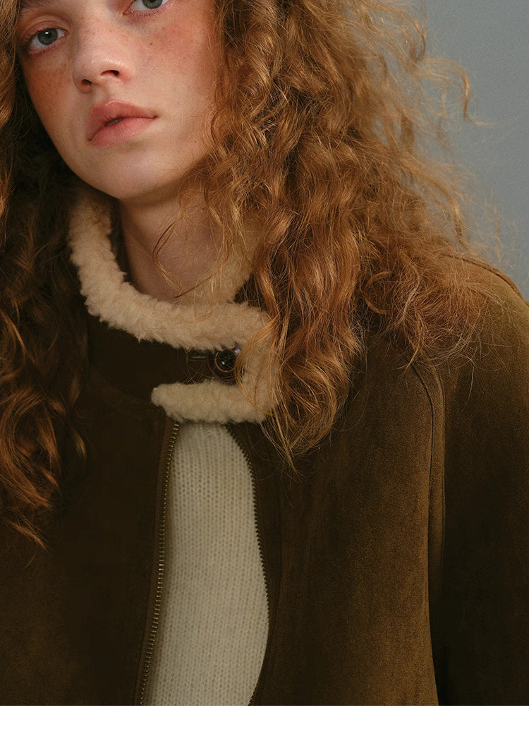 Close-up of dark coffee brown shearling-trim stand collar