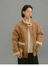 Light camel suede shearling-trim jacket front view on model