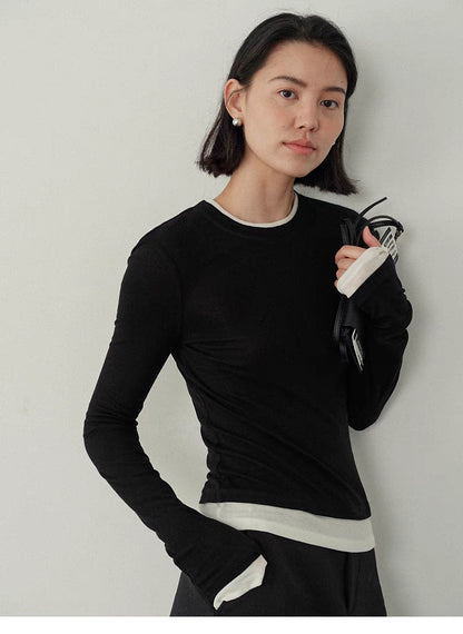 Contrast-Trim Slim-Fit Long-Sleeve Top black and white close up upper body slim silhouette contrast cuffs detail
