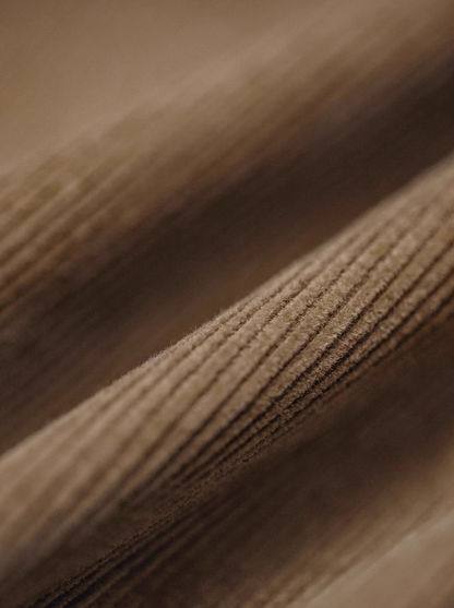 Close-up of desert brown corduroy fabric texture