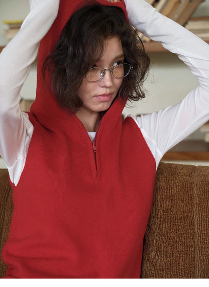 Red Cozy Sleeveless Pullover Sweater with hood up, front view showing half-zip closure and soft wool knit texture