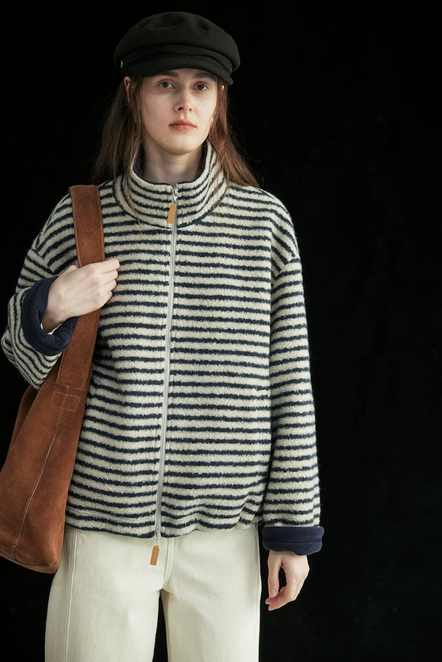 Close-up of a Cream/Navy Stripe jacket&