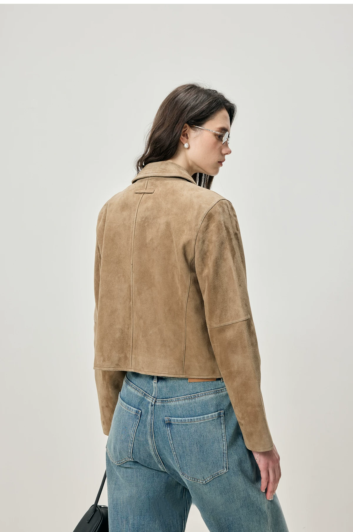 Back view of fawn sheepskin suede jacket with center seam and point collar
