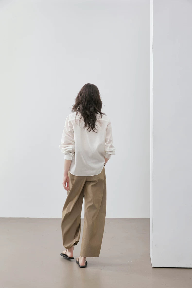Back view of ivory Cuban collar shirt showing dropped-shoulder silhouette