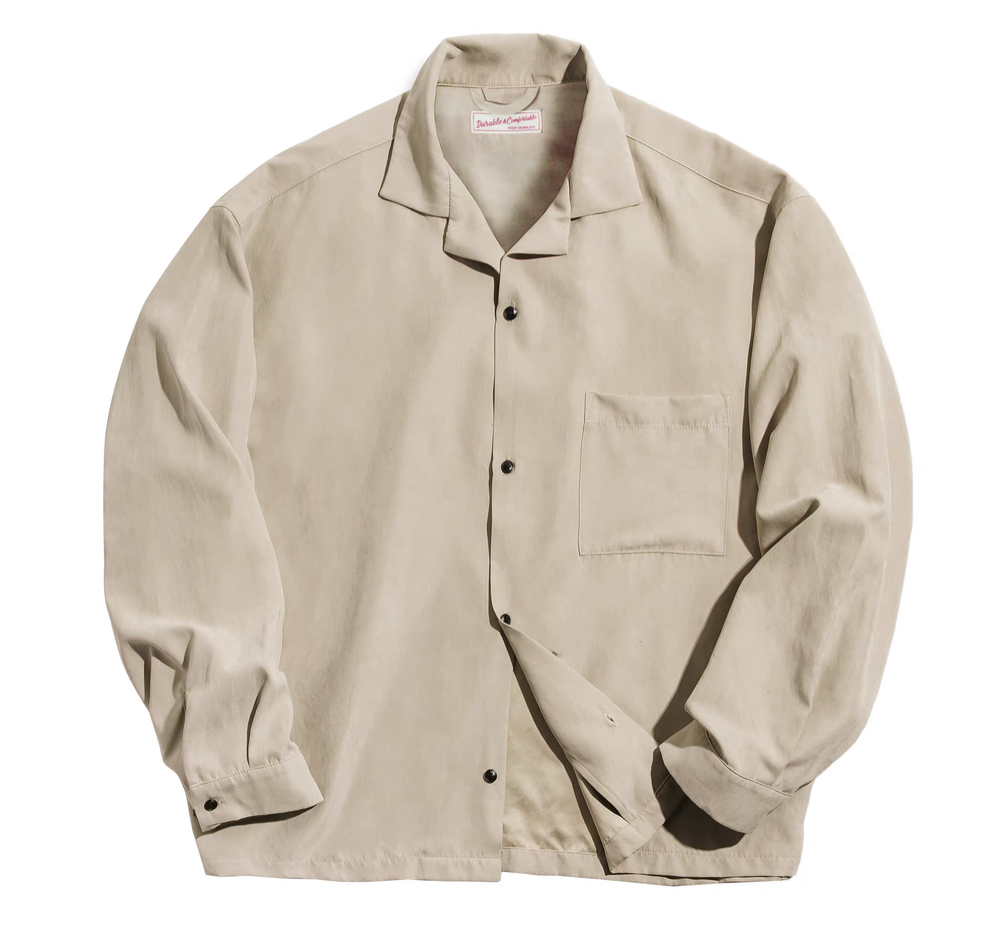 Light khaki Cuban collar overshirt flat lay, peached finish fabric.