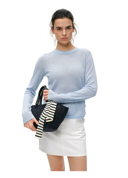 Powder blue cupro-silk ribbed knit top, front view with bag