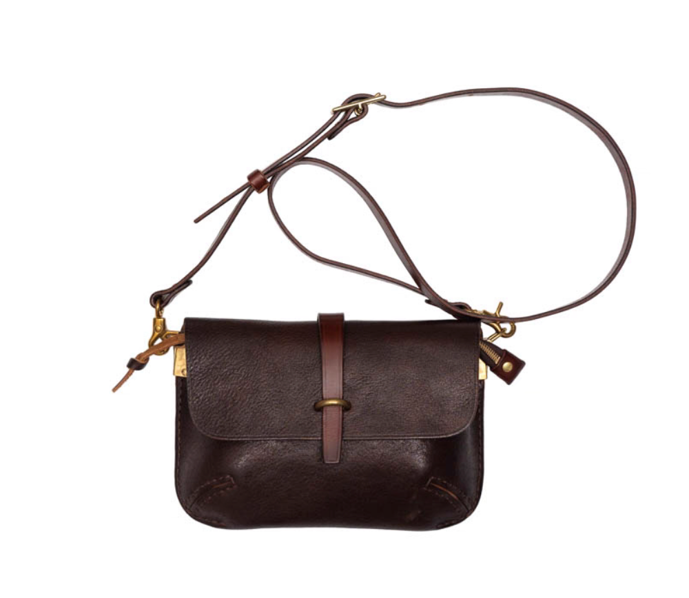 Hand-stitched Italian full-grain leather crossbody with brass hardware and minimalist design — timeless espresso brown for daily carry.